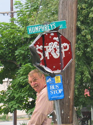 What is this man doing and why is he in this picture?